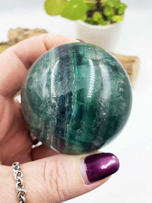 Green Fluorite Sphere with rainbow flashes