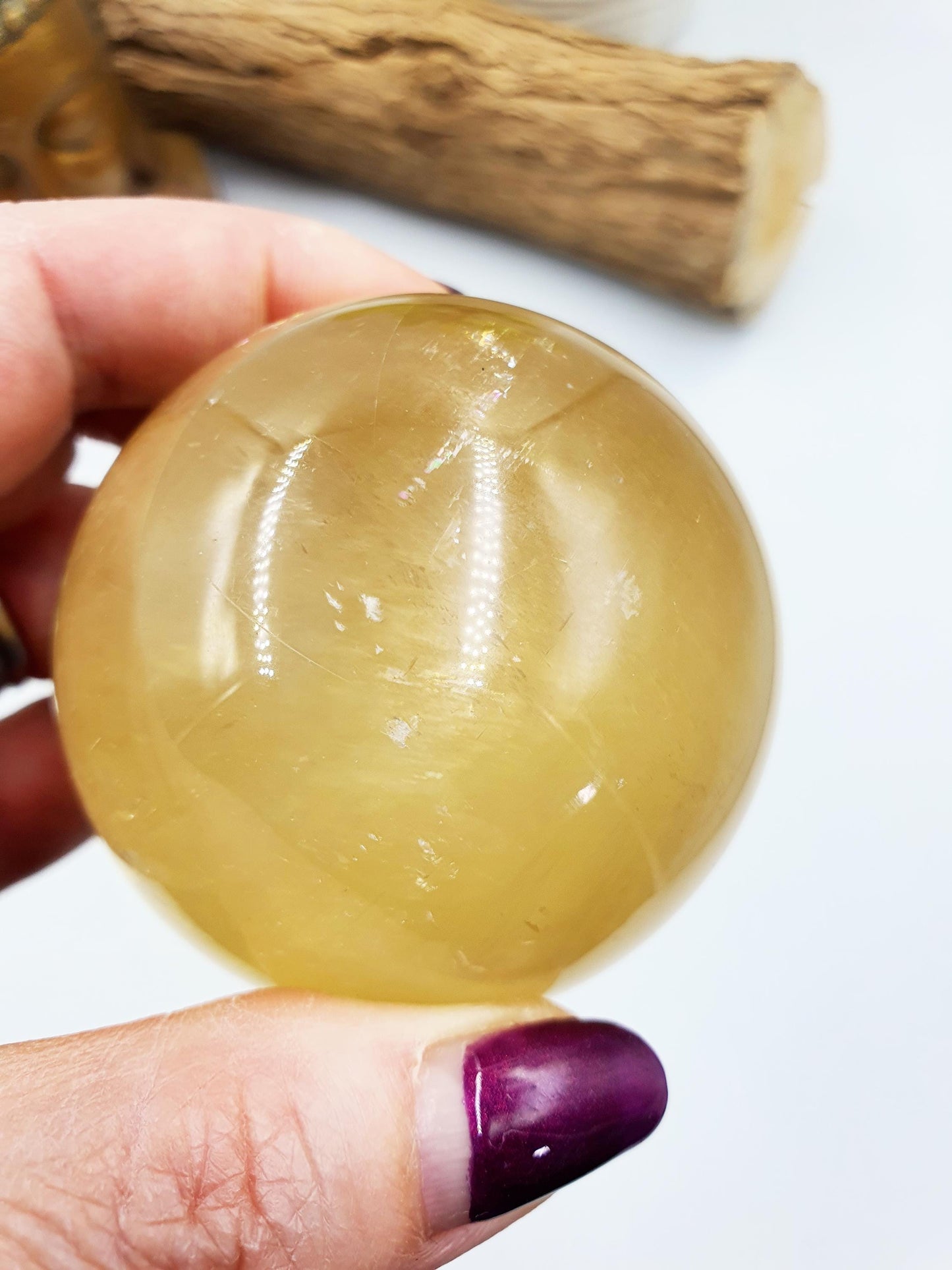 Flashy Yellow Calcite Sphere with rainbows