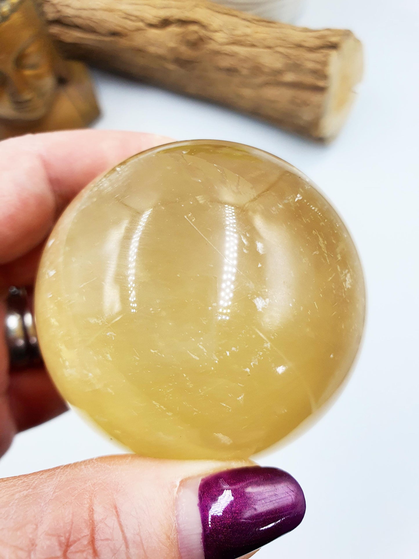 Flashy Yellow Calcite Sphere with rainbows