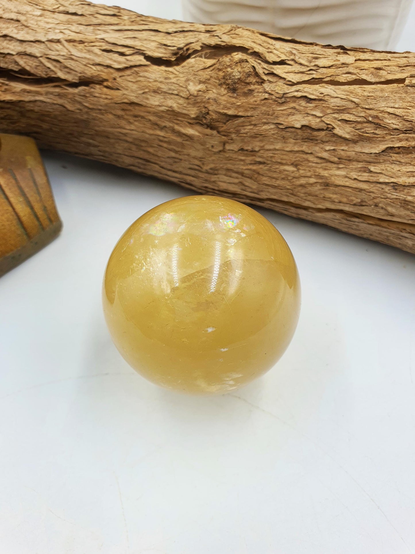 Flashy Yellow Calcite Sphere with rainbows