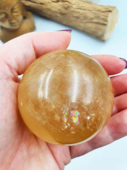 Flashy Yellow Calcite Sphere with rainbows