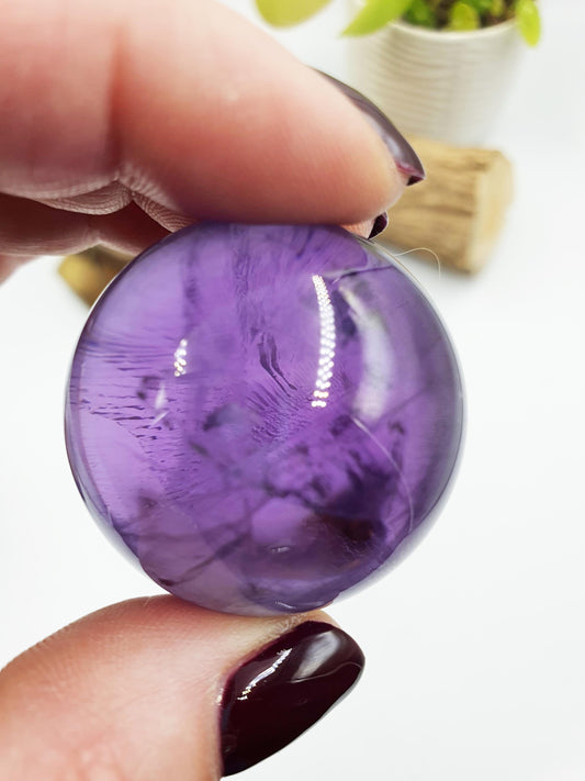 A Grade Amethyst Sphere with finger print inclusions