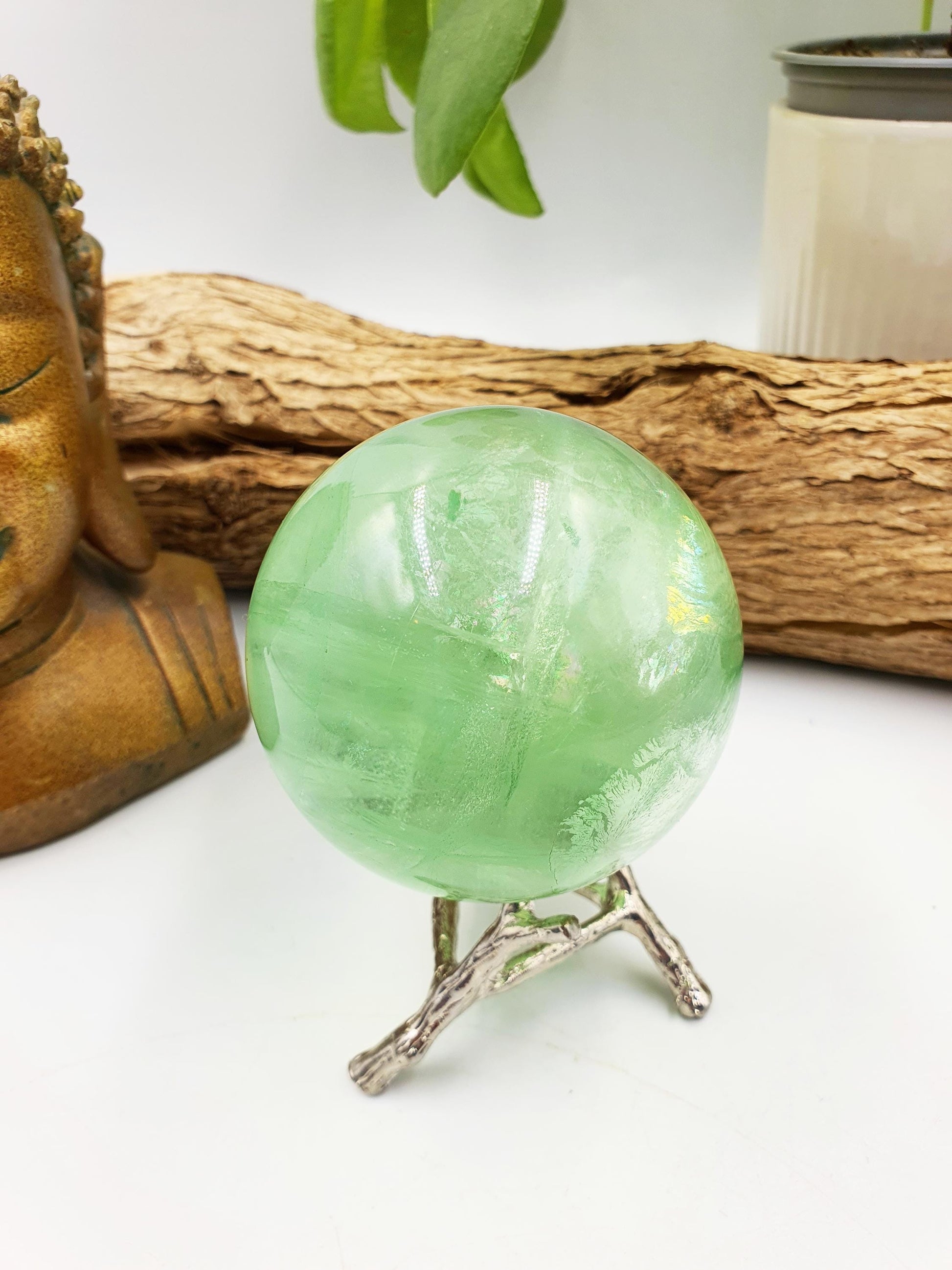 A Grade Green Fluorite Sphere with rainbows