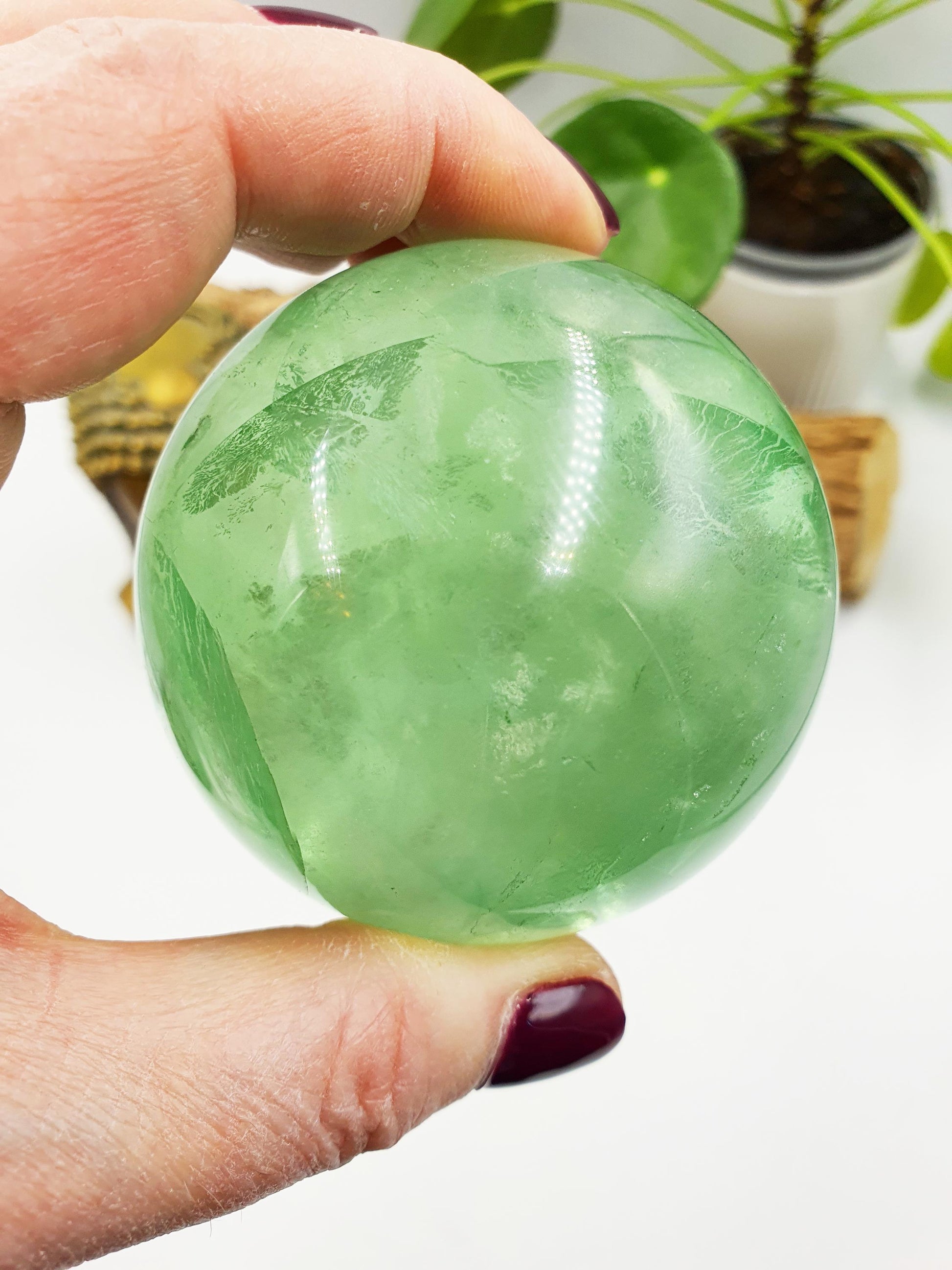 A Grade Green Fluorite Sphere with rainbows