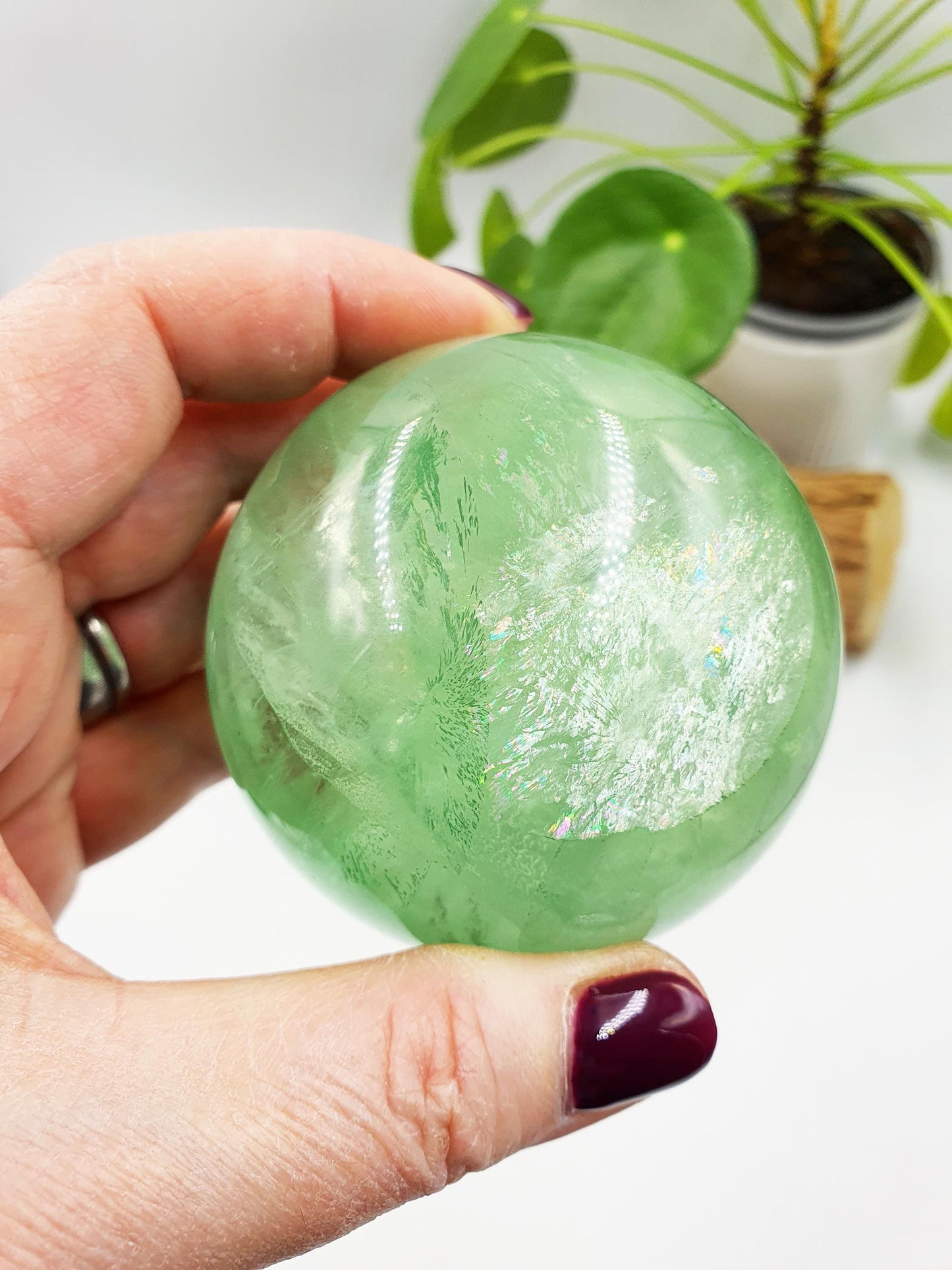 A Grade Green Fluorite Sphere with rainbows