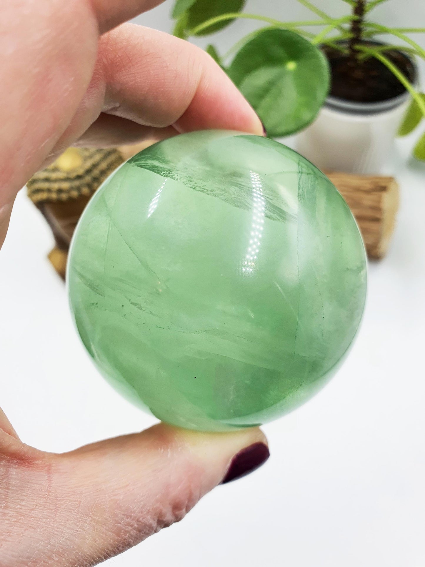 A Grade Green Fluorite Sphere with rainbows