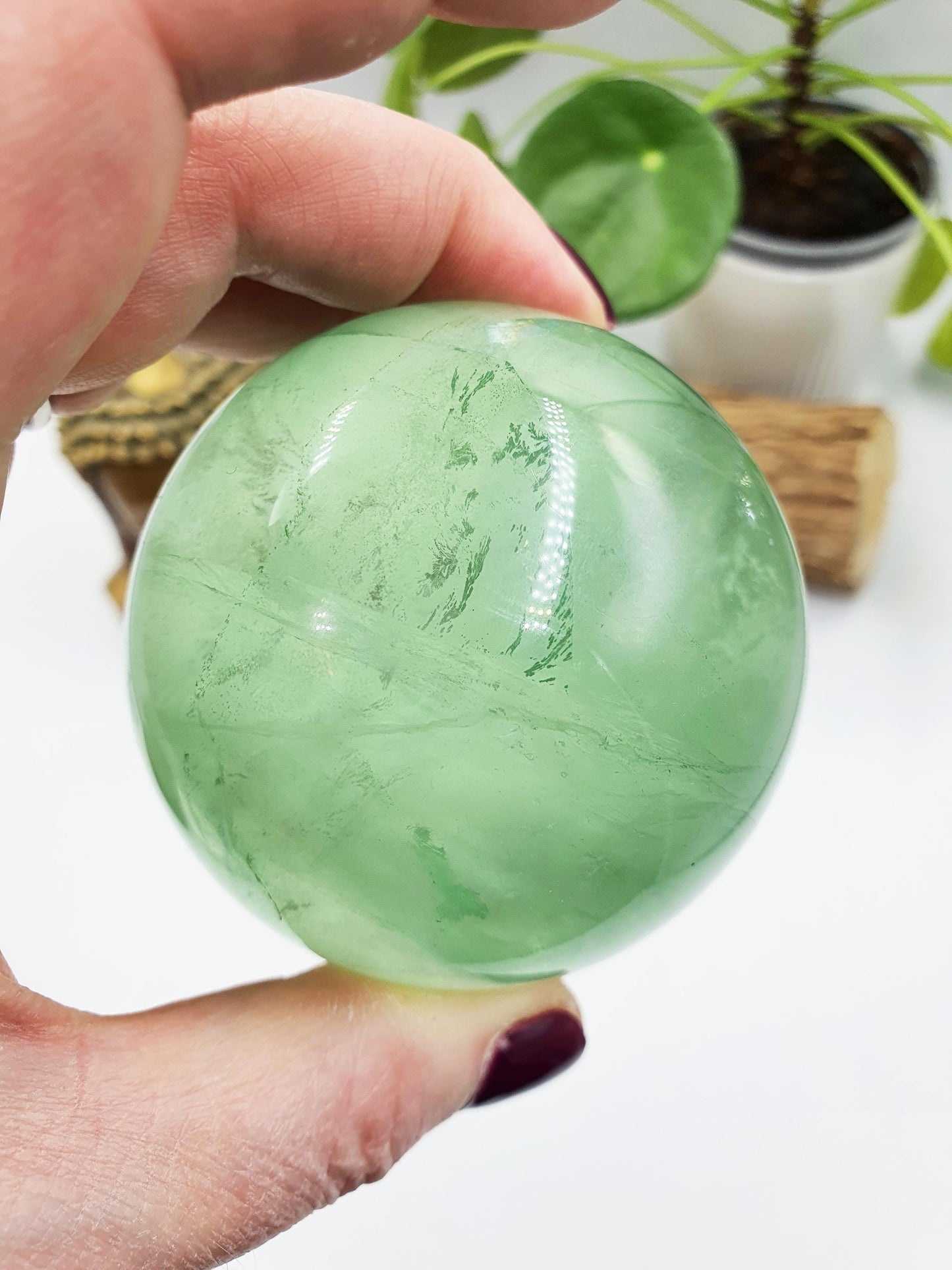 A Grade Green Fluorite Sphere with rainbows