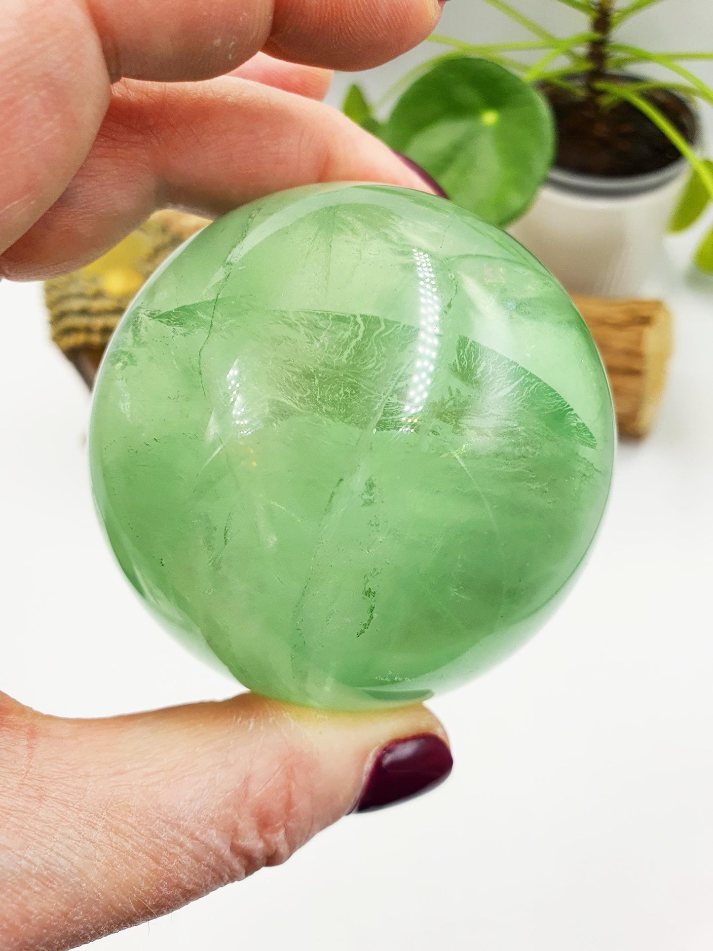 A Grade Green Fluorite Sphere with rainbows