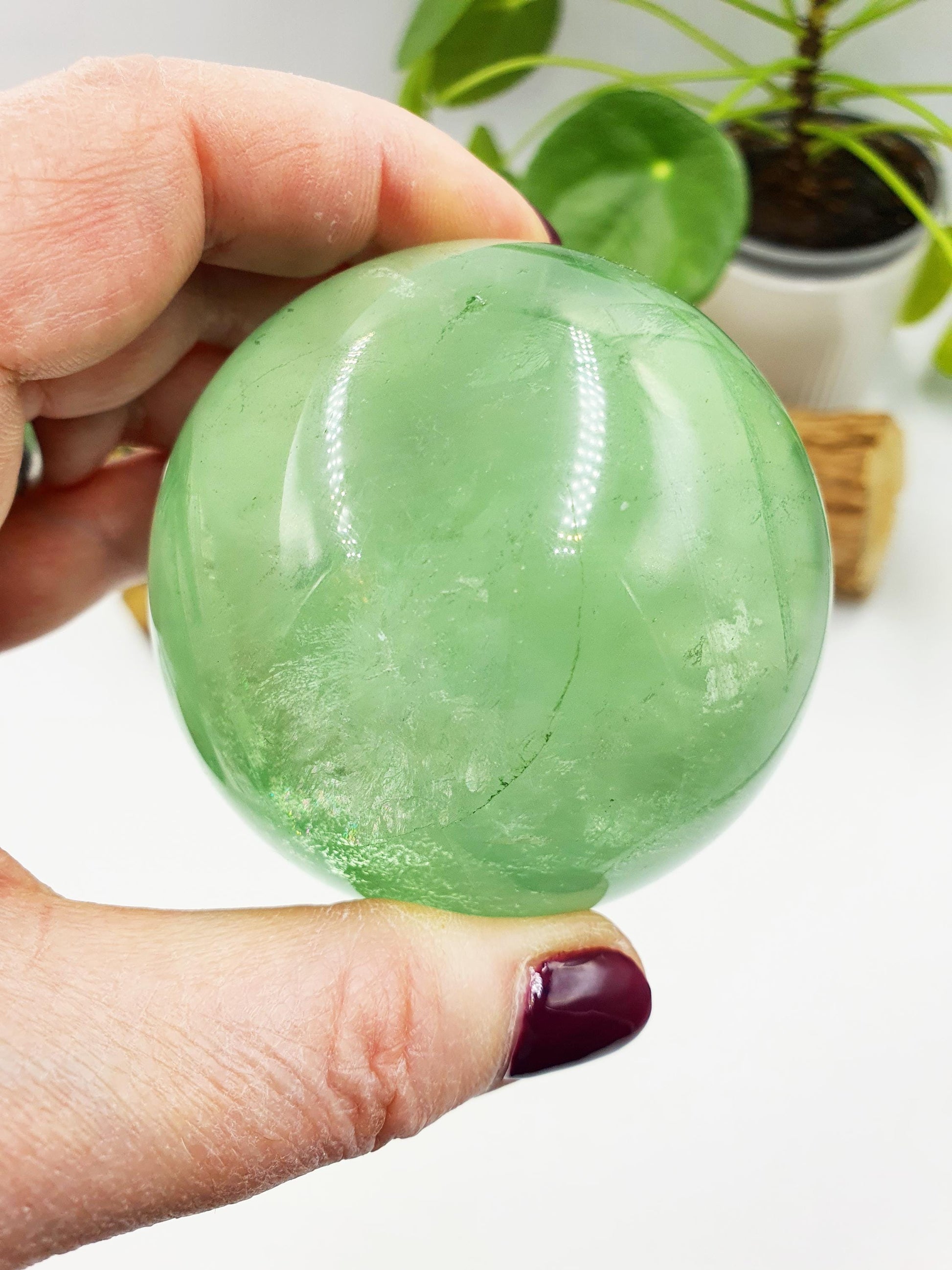 A Grade Green Fluorite Sphere with rainbows