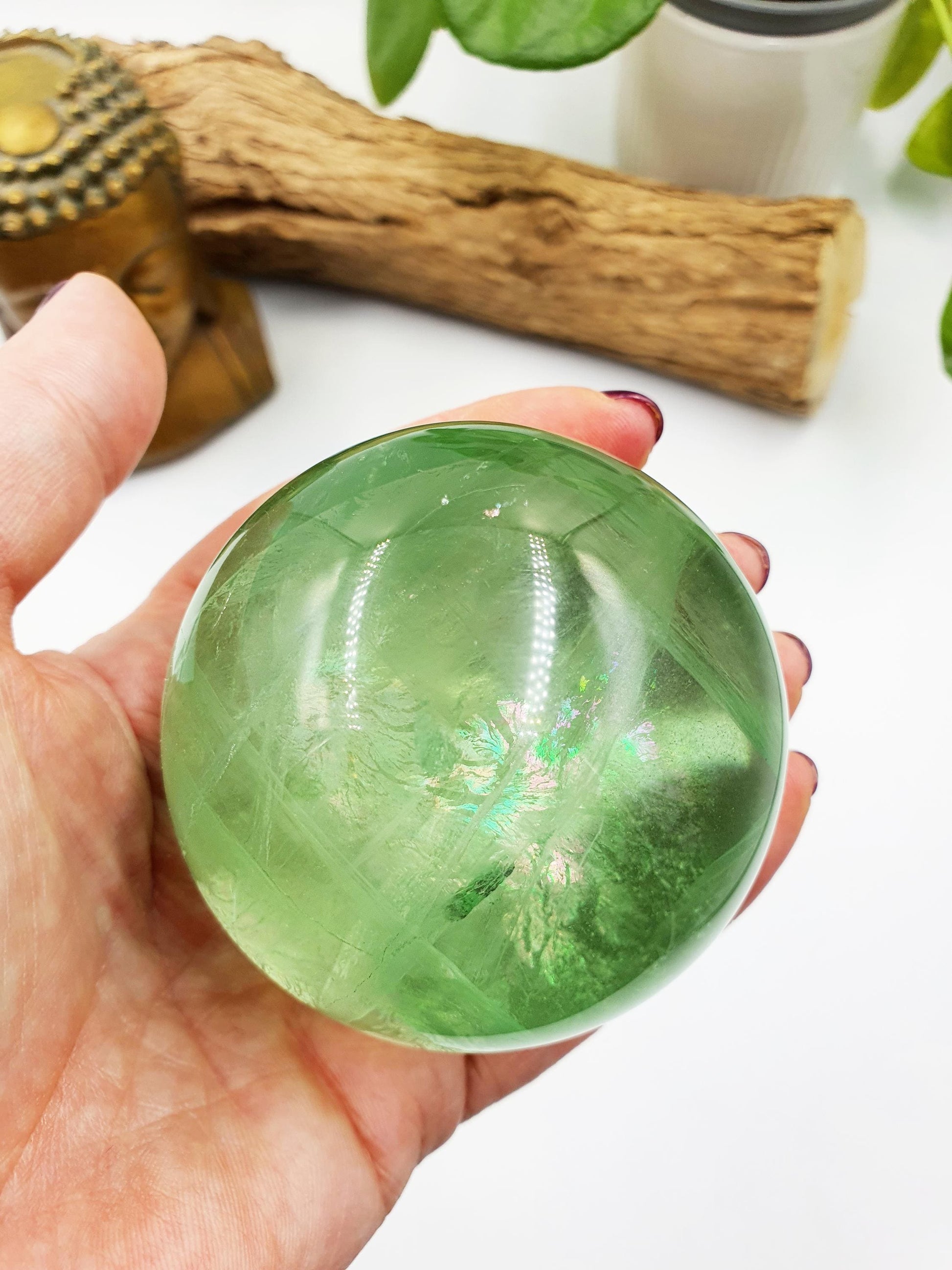 A Grade Green Fluorite Sphere with rainbows